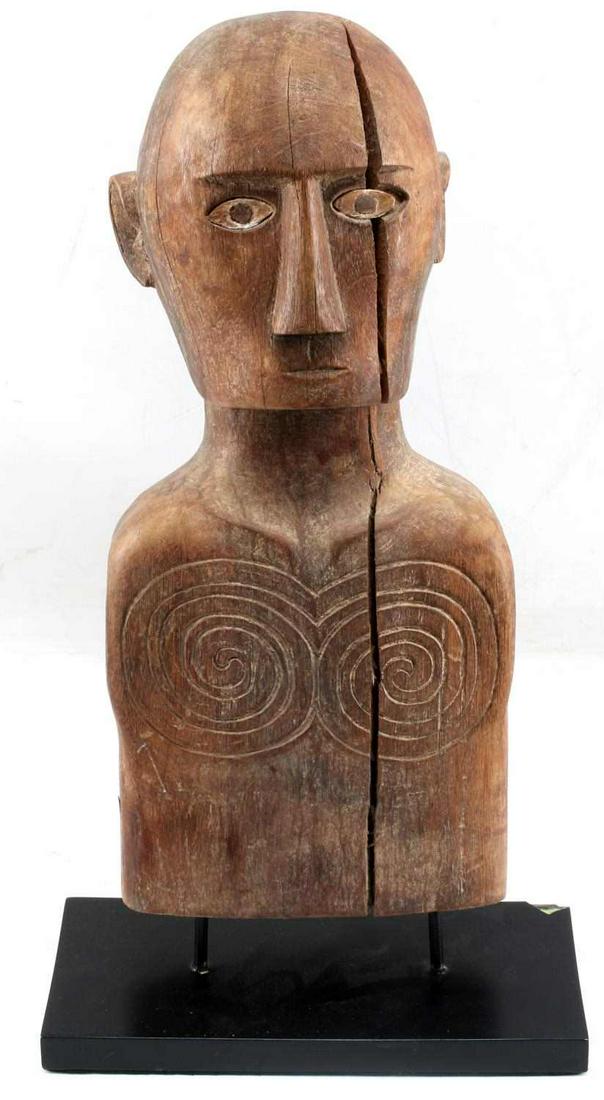 TUA TUA SULAWESI MORTUARY GUARDIAN FIGURE: Tau tau figure, effigy piece used by the Toraja people of South Sulawesi, are placed at mortuaries as guardians of the deceased. This tau tau sculpture is missing his arms and legs. Holes at the shoul