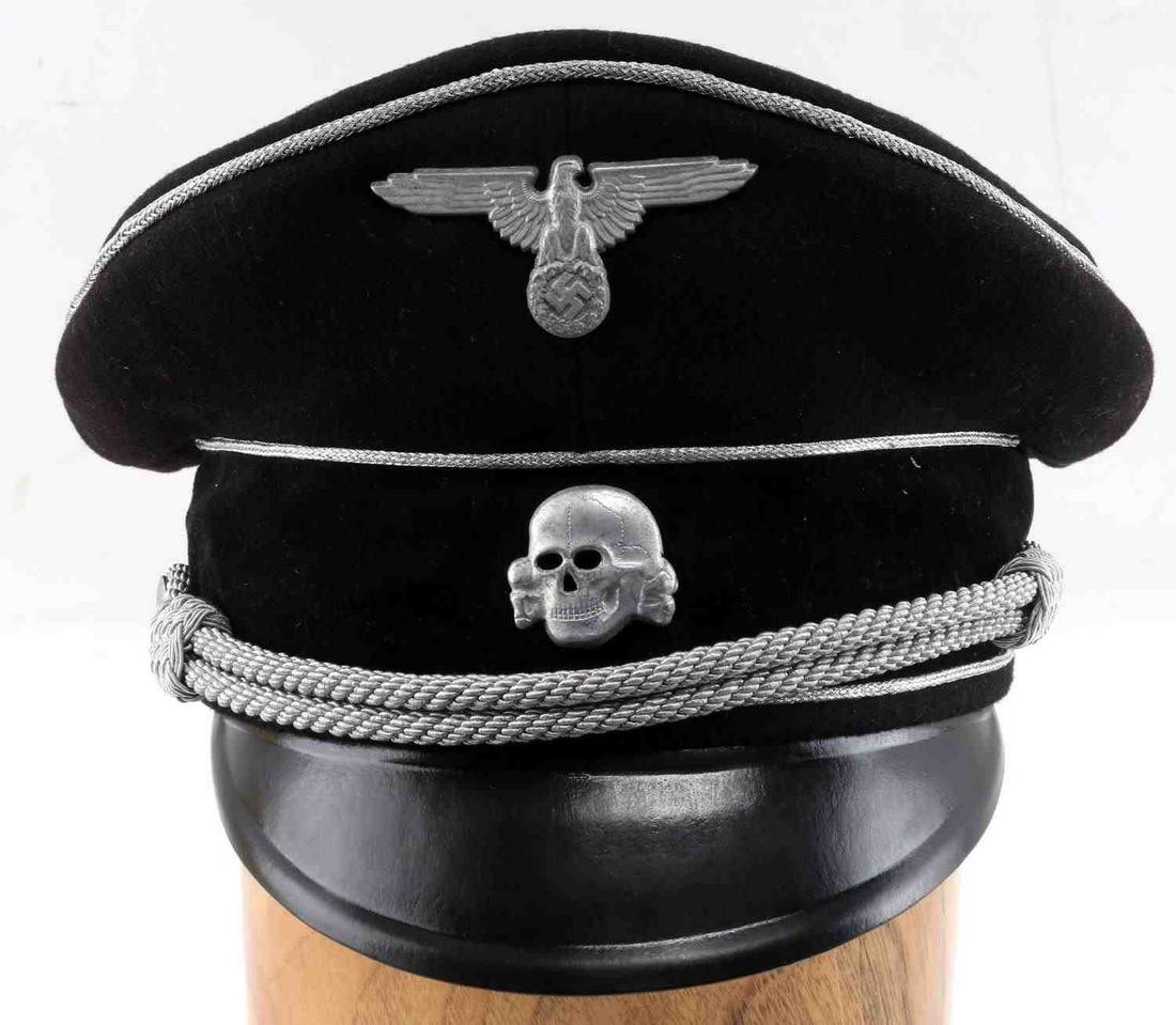 WWII GERMAN ALLGEMEINE SS GENERALS VISOR CAP: Private purchase tailor type hat. Period sweat diamond was removed to make cooler in the summer. Silver piping and insignia to front center. General's double band chinstrap. Black interior with brown 