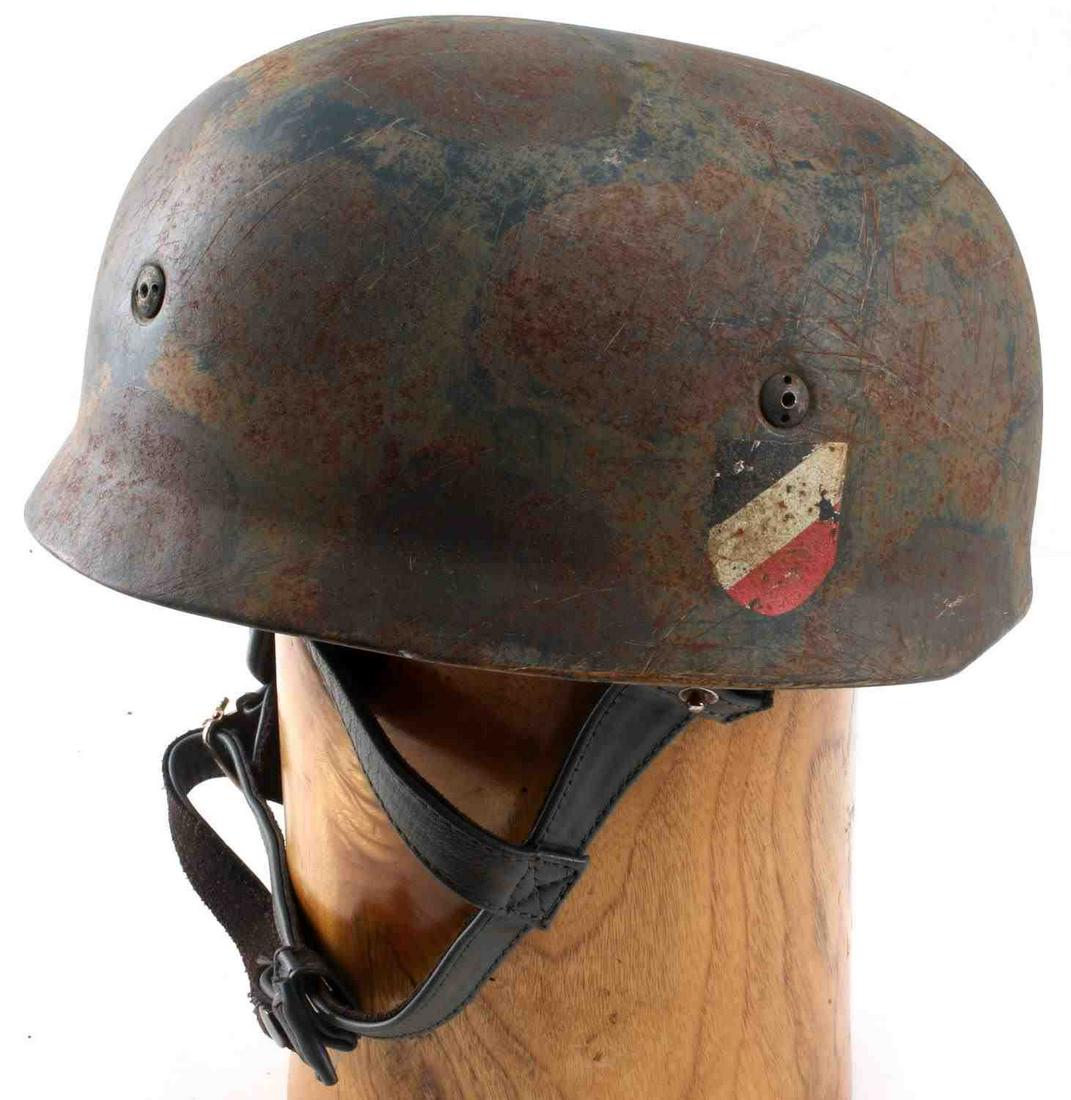WWII GERMAN 3RD REICH LUFTWAFFE PARATROOPER HELMET: WWII German 3RD Reich Luftwaffe Paratrooper Helmet. Double decal style helmet, National Shield on th right side and the Luftwaffe Eagle on the left. The helmet is complete with the liner and chinstrap