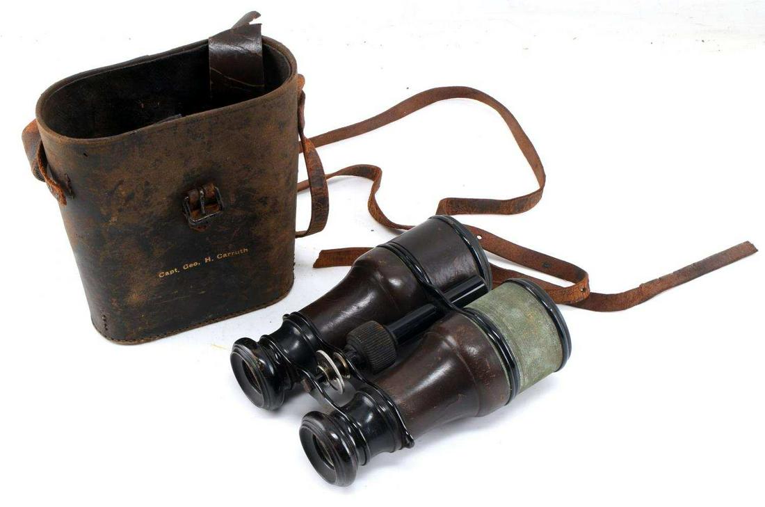 CONFEDERATE COMPANY H LOUISIANA TIGERS BINOCULARS: The case is named to Geo. H. Carruth, Company H Louisiana Tigers, case is good condition somewhat frail with age, binoculars are stamped Made In France, missing leather wrap on one optic, lenses are c