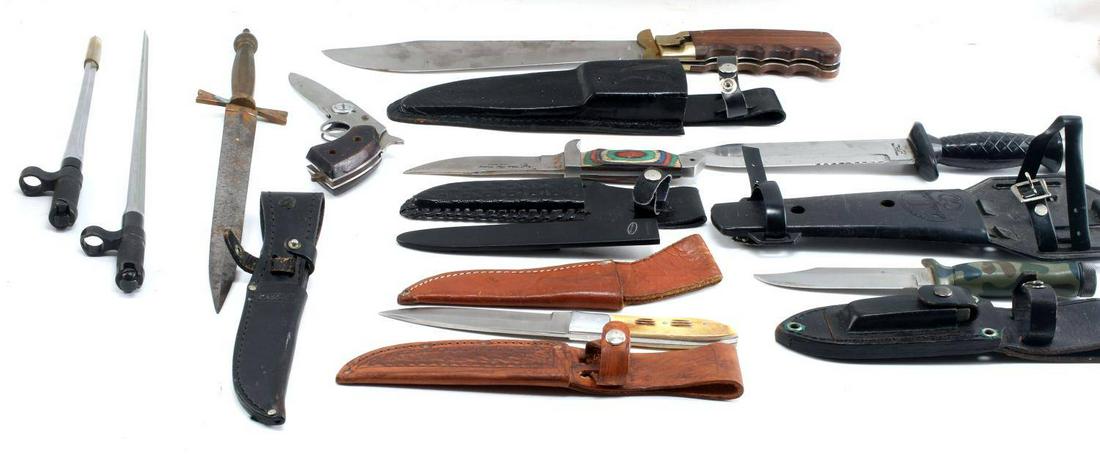 MIXED LOT OF 9 KNIFE AND BAYONET SOME SHEATHS: Lot includes: Japan knife with a 7.25 inch blade and plastic grip and sheath, King Cobra Hunter knife in box, Parker Bros. knife with camo grip and leather sheath, two custom knives with bone and wood