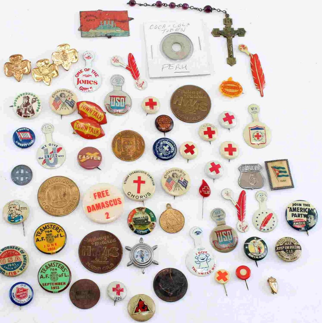 LOT EXONUMIA PINS PIN BACKS TOKENS 1950S: Lot of religious and charitable organization pins and pin backs from the 1950s including: American Red Cross, Girl Scouts of America, Salvation Army, Teamsters A.F.L 1951, Steel Workers Organizing Com