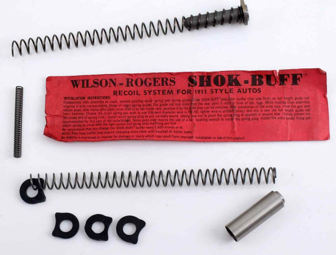 COLT 1911 WILSON ROGERS SHOK BUFF RECOIL SPRING: Colt 1911 Wilson-Rogers Shok-Buff Recoil Spring System. Includes two springs, 18.5 and 12 pounds, recoil spring plug and four poly fiber buffers. The lot is in good condition