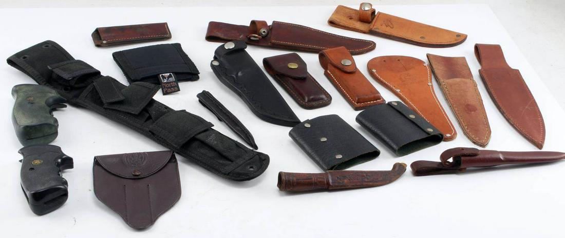 LOT OF MIXED LEATHER KNIFE SHEATHS GUN GRIPS MORE: Lot includes: leather knife sheaths, pocket knife sheaths with Gerber and LL Bean, 2 Pachmayr grips for Ruger Blackhawk and S&W square butt, large nylon knife sheath, and more. Good condition.