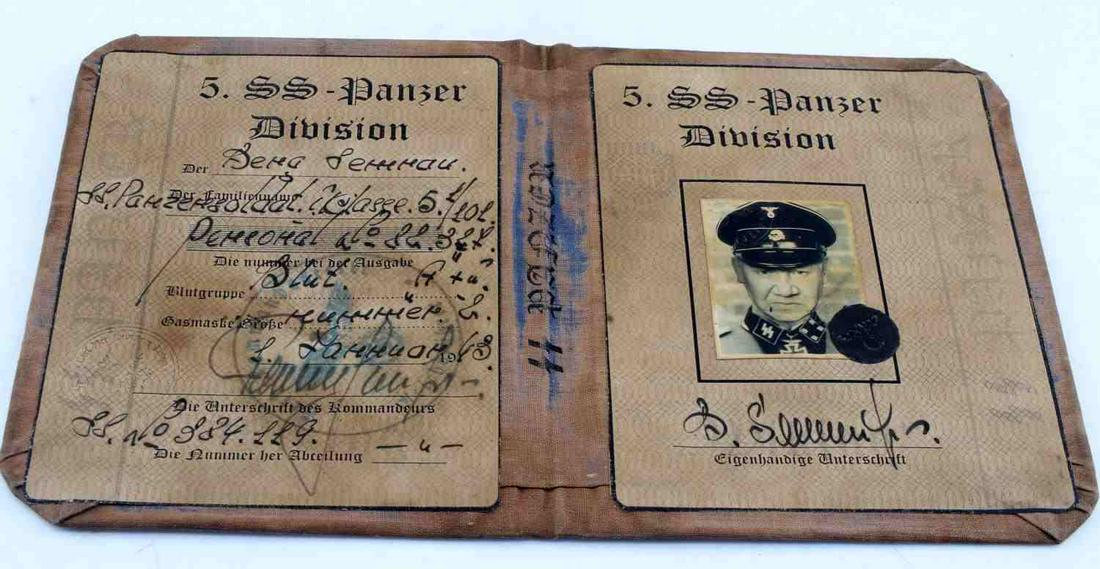 WWII GERMAN THIRD REICH WAFFEN SS PANZER AUSWEIS: WWII German Third Reich Waffen SS Panzer Ausweis ID Book. Stamped "Wiking" on front of the ID book. Measures 5.25 by 4.25 inches. Staining and discoloration throughout the book. Very good condition. U