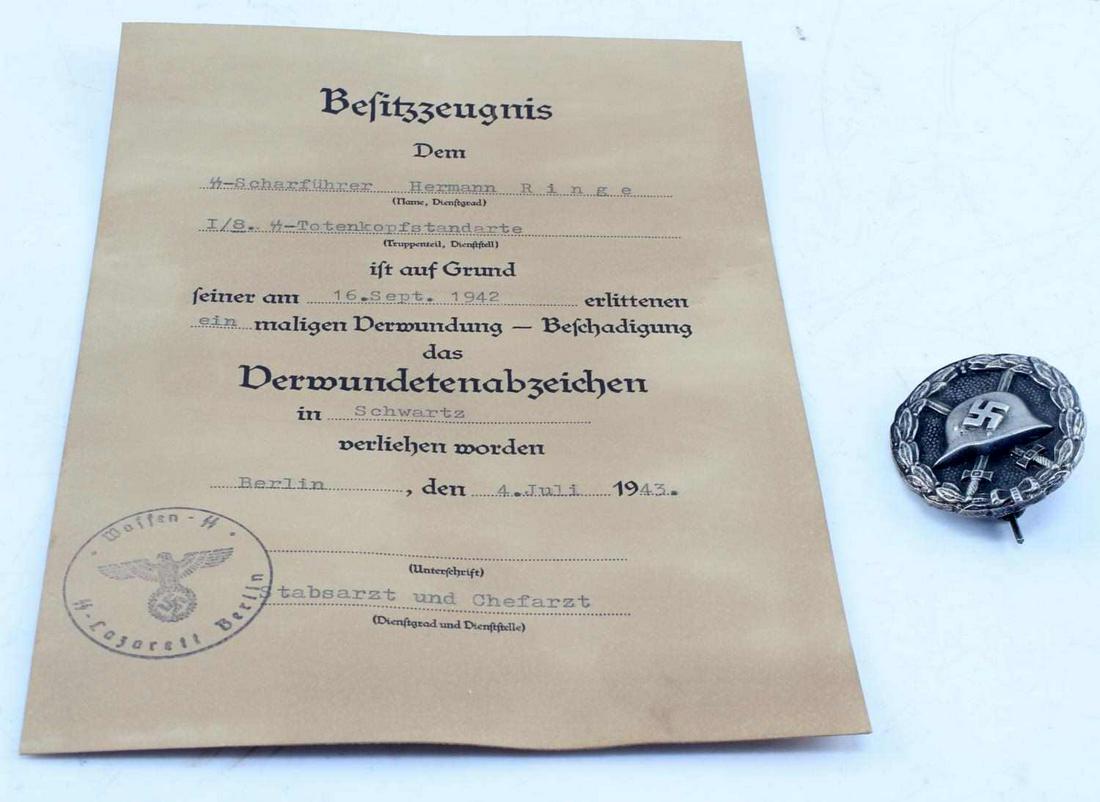 WWII GERMAN THIRD REICH HEER SILVER WOUND BADGE: WWII German Third Reich Heer Silver Wound Badge. Vertical pin back with a scooped rear. Comes with the certificate award. Given to Hermann Ringe on Sept 16, 1942. Very good condition. Unauthenticated;