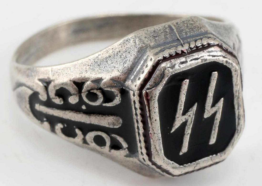 WWII THIRD REICH GERMAN WAFFEN SS SILVER RING: SS runes at front center with circular design at sides, black enamel, marked 800 to rear, size 10.5, weighs 5.9 grams. Unauthenticated, sold as is. This lot has a reserve.