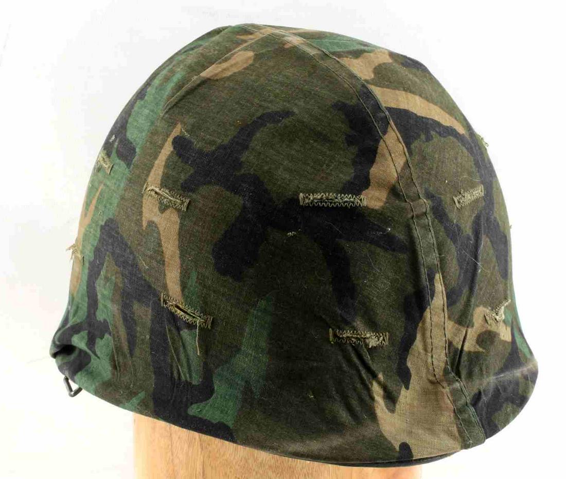 US ARMY KOREAN WAR ERA M1 HELMET WITH LINER: US Army Korean War Era M1 Helmet with Liner. The helmet is stamped "623" on the inner front brim. The liner is stamped "Liner Helmet Ground Troops Type 1". The helmet cover is stamped "Cover Helmet Ca