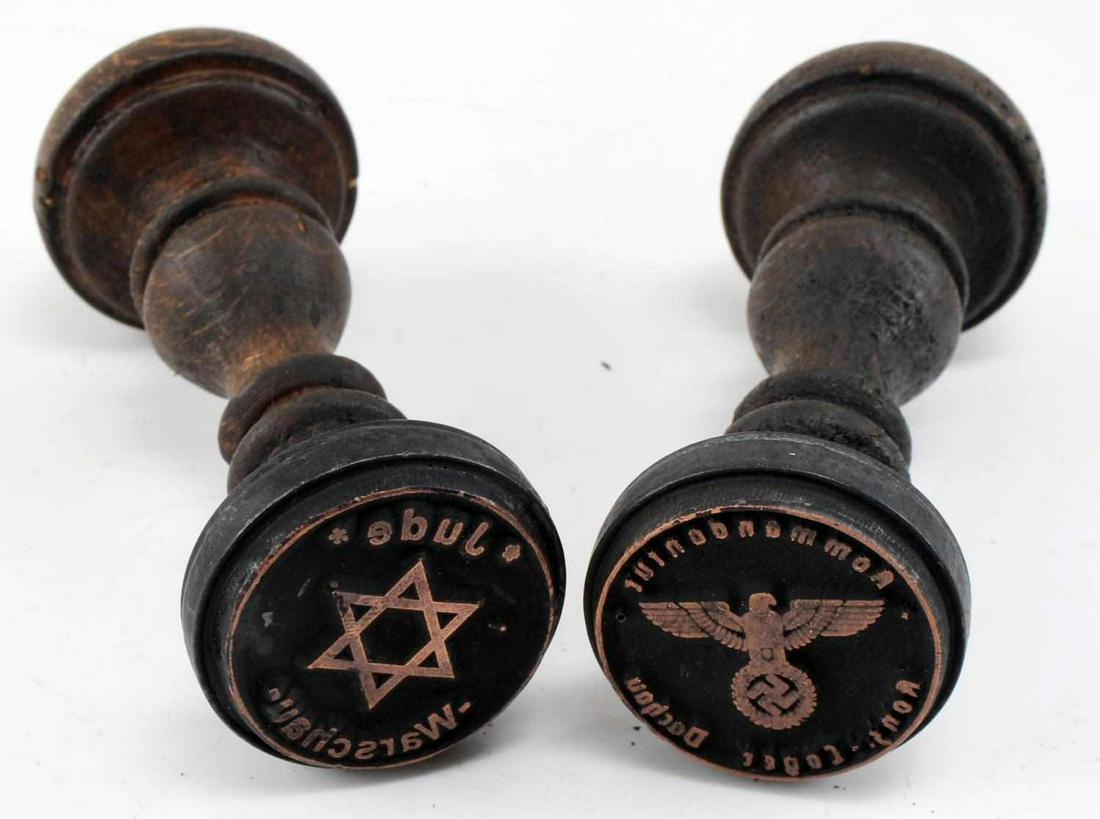 2 WWII GERMAN HOLOCAUST HAND STAMPS DACHAU: Two hand stamps: Warsaw ghetto Jewish mail and Dachau concentration camp. Measure 4.75 inches long. Unauthenticated, sold as is. This lot has a reserve.