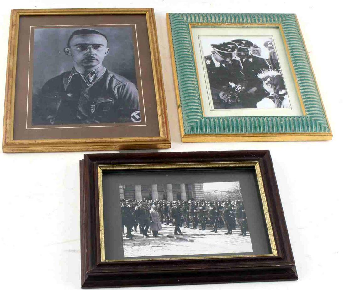 WWII GERMANY 3 FRAMED PHOTOS OF HEINRICH HIMMLER: Group of three framed photos of Heinrich Himmler. These include a self portrait (frame 7.5x10 inches), him greeting children (frame 7x9 inches), and him reviewing soldiers in a parade (frame 7x9 inche