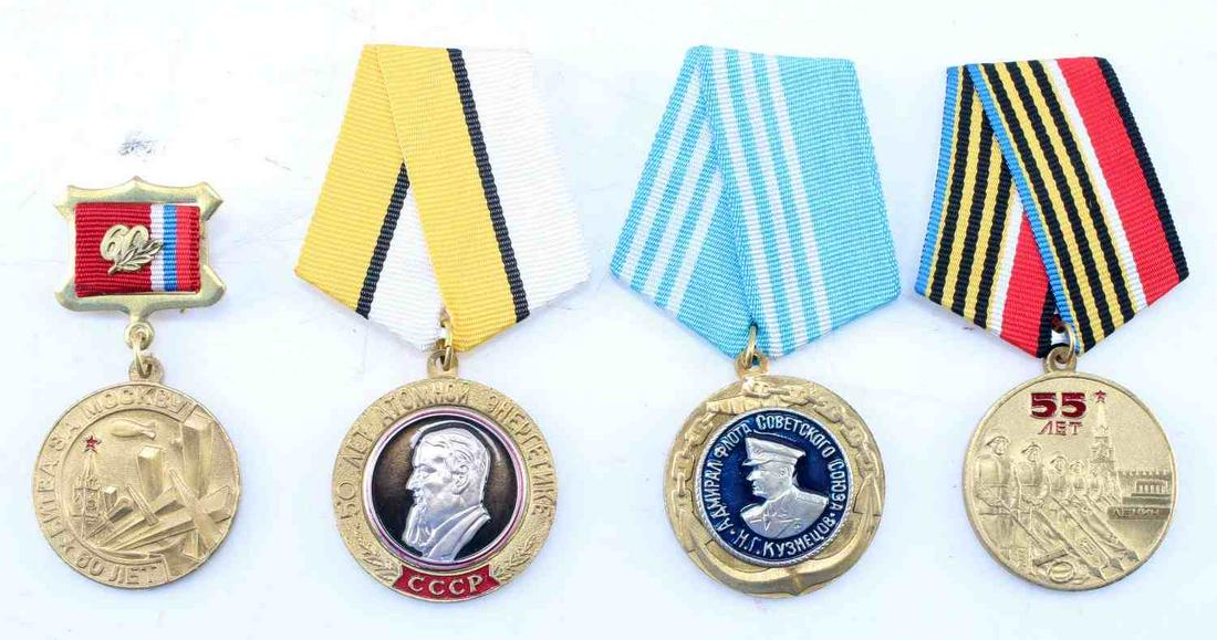 ORIGINAL RUSSIAN MILITARY MEDAL WITH RIBBON LOT OF FOUR: Russian Military Medal with Ribbon Lot of Four. Includes one 1998 Soviet medal, 1955 Naval medal, 2001 commemorative medal and one Moscow Rebuilding medal post WWII. Overall, good condition. Guarantee