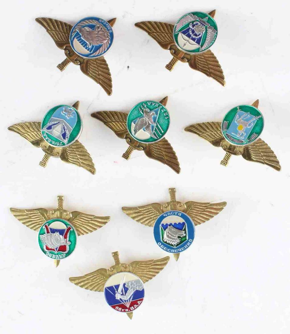 FULL SET OF 8 ORIGINAL RUSSIAN PARATROOPER WINGS: Measure 2 inches wide. Have screw on style back. Overall, very good condition. Guaranteed original by consignor.