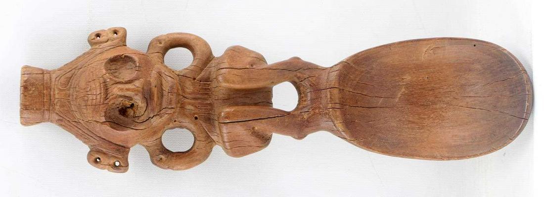 PRECOLUMBIAN TAINO ANTHROPOMORPHIC WOODEN LADLE: Exceedingly large anthropic ladle. Probably represents 1 of the 3 female goddesses identified in Taino creation lore. Made of lignum vitae or iron wood. Usually large ladies were used to distribute co