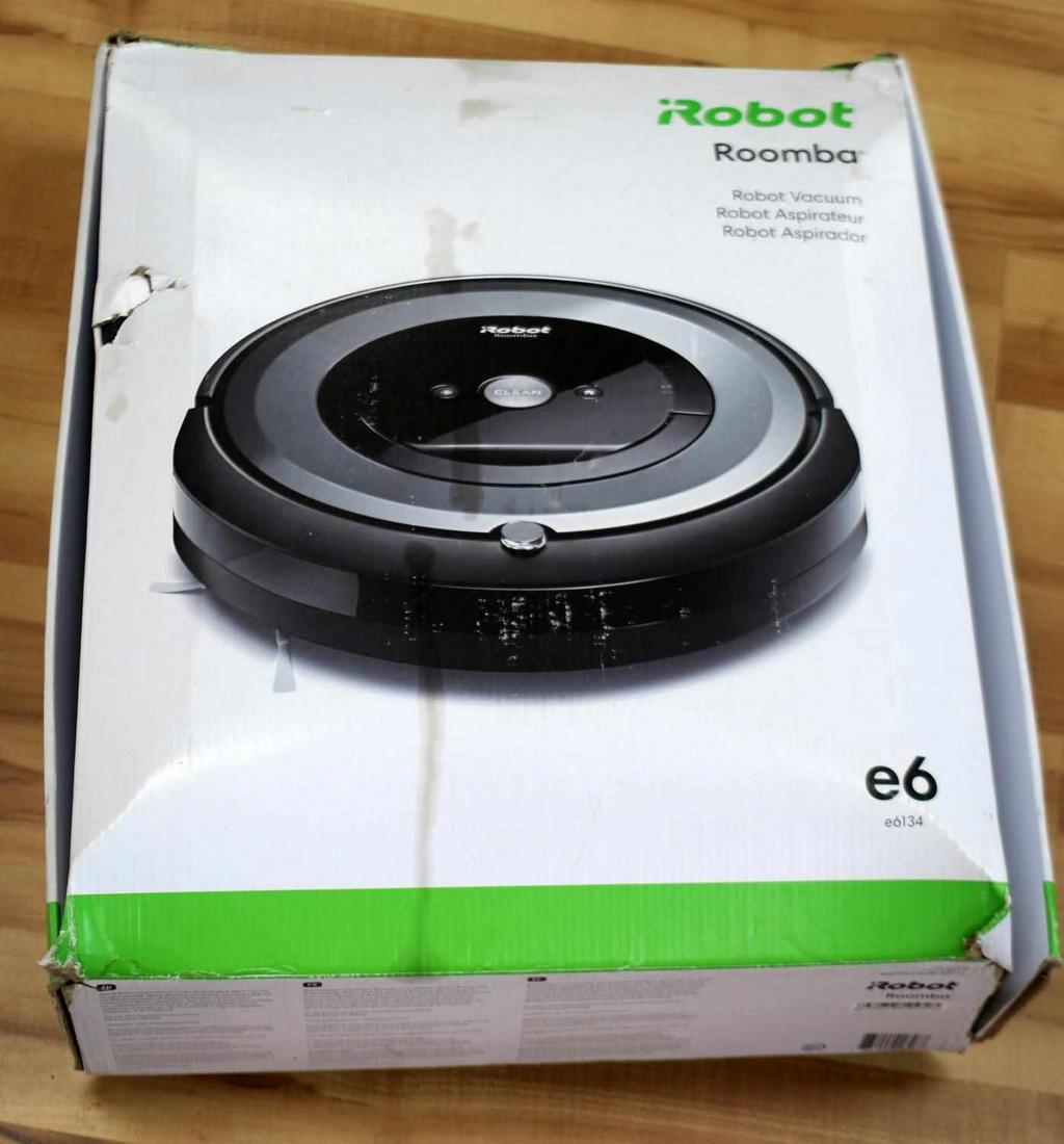 NEW IROBOT ROOMBA E6 WIFI ROBOT VACUUM SYSTEM: New I-Robot Roomba E6 robot vacuum system. Features Roomba E6 robot vacuum, home base charging station, and 1 extra filter. Wifi connectivity for convenience. Box is opened and has minor cosmetic dama