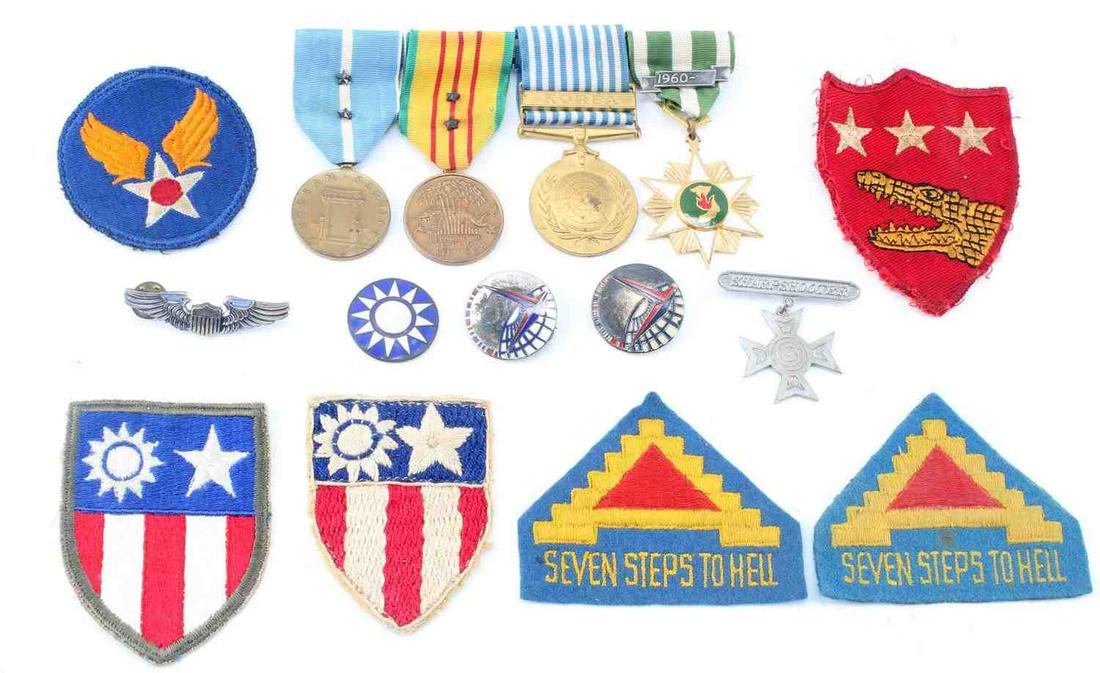 LOT OF RARE MILITARY MEDALS AND PATCHES: Lot of 15 rare military medals and patches. These include a theatre made China Burma India Flying tigers patch and later made patch, 2 "Seven Steps to Hell" patches, Korean Service medal, Vietnam Serv
