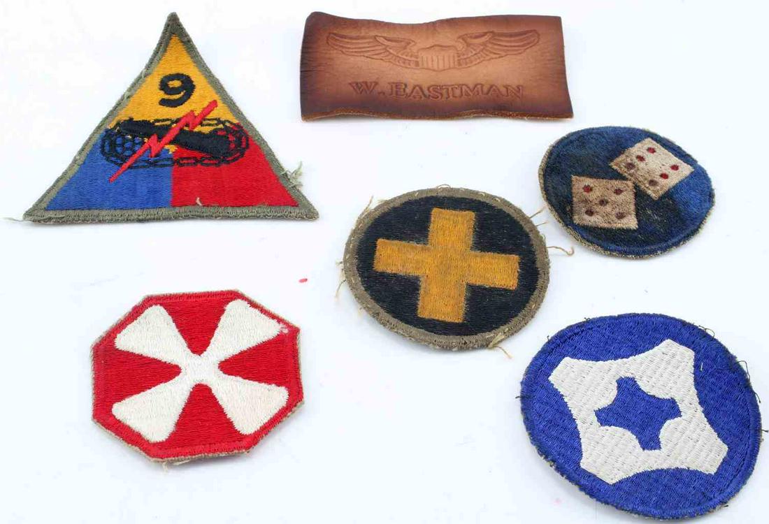 WWII UNITED STATES THEATER MADE PATCH LOT OF 6: WWII United States Theater Made Patch Lot of 6. Lot includes patches of the 6th Armored Division, 33rd Infantry Division, 11th Corps, 8th Korea Army, 4th Service Command and one "W. Eastman" leather p