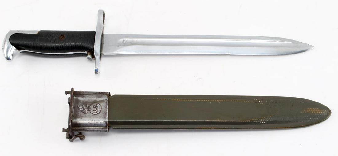 WWII M-1 GARAND US PAL DRESS BAYONET W SCABBARD: Flaming grenade on blade, 1943 date, polished to dress, has S1 in grip steel above cross guard, scabbard has elongated VP over 30, 10 inch blade. This lot has a reserve.