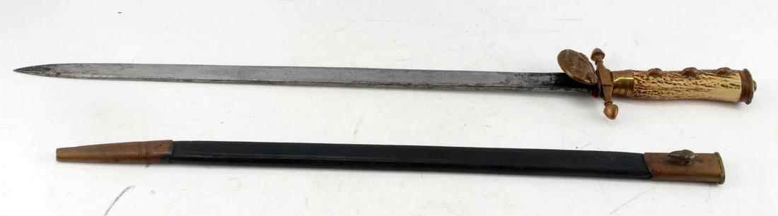 GERMAN EARLY HUNTING SWORD WITH BONE HANDLE: German early hunting sword with bone handle. Blade measures 19 inches and entire sword measures 25 inches. Blade is sharp at point but not on cutting edge. The blade also features an ornate pattern. H