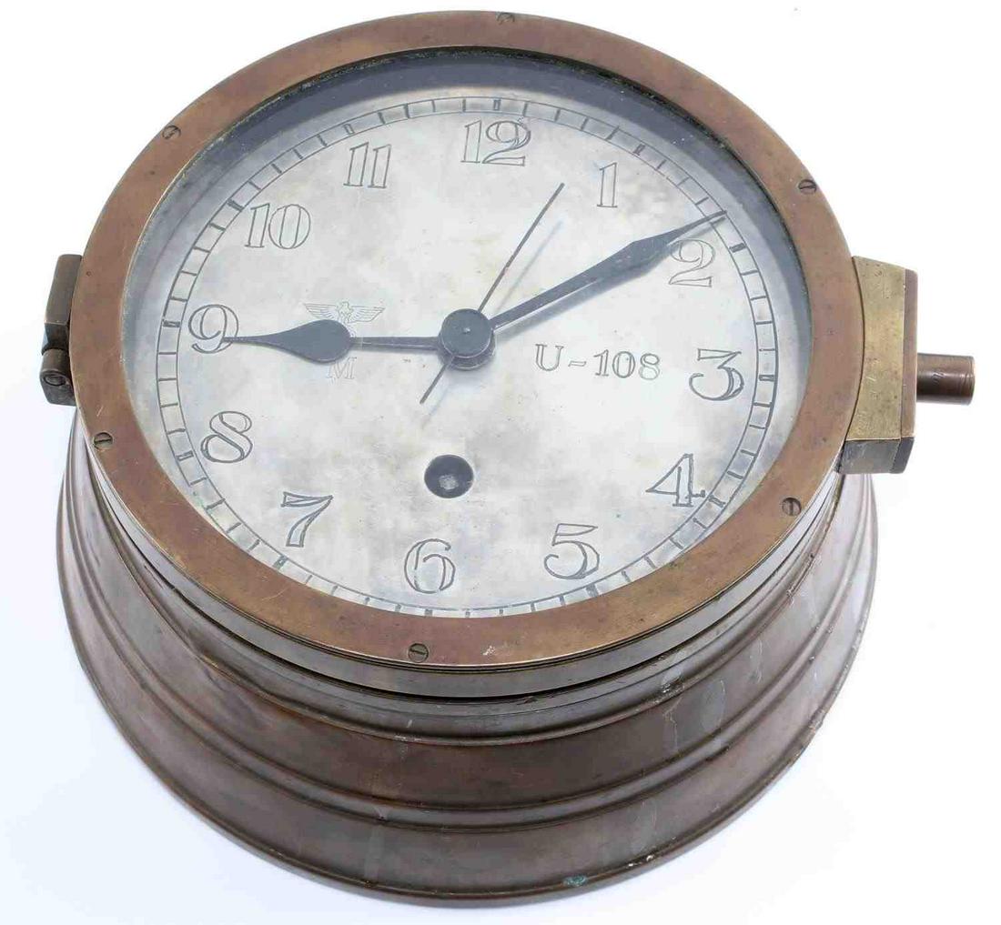 WWII GERMAN U BOAT IXB U-108 INNER DECK CLOCK: WWII German U Boat Inner Deck Clock from IXB U-108. Clock is in working order but comes with a replacement winding and locking key. Two of the brass loops are missing due to the removal of the clock f