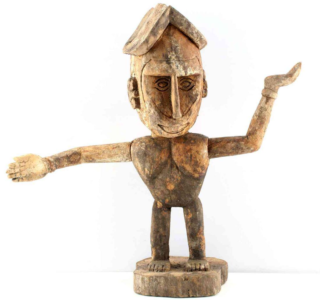 AITOS INDONESIAN TOTEM ANCESTRAL FIGURE: Aitos are totem-like figures representing ancestors. They are placed outdoors where they are regularly ”fed’ with offerings from village residents. Dimensions: 22x22x7, arms are detachable. This l