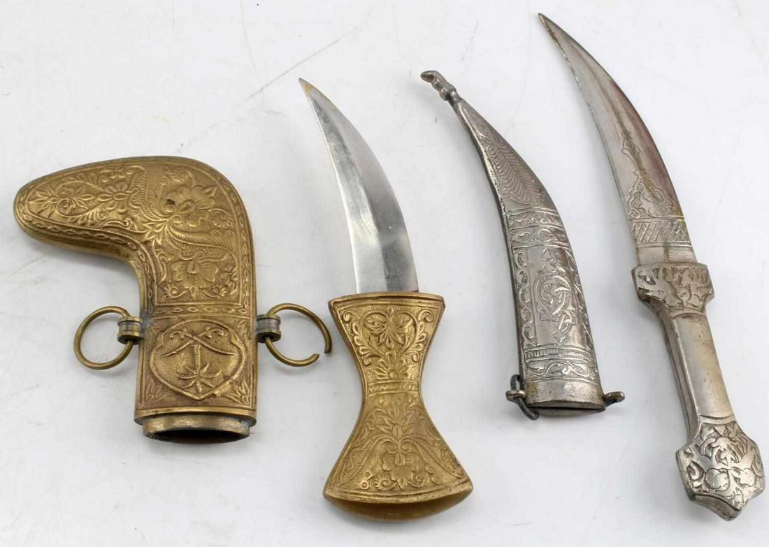 MIDDLE EASTERN JAMBIYA DAGGERS KNIFE LOT OF 2: Decorated sheaths, very good blades especially the brass scabbard one, in scabbards they measure 7 and 9 1/2 inches.