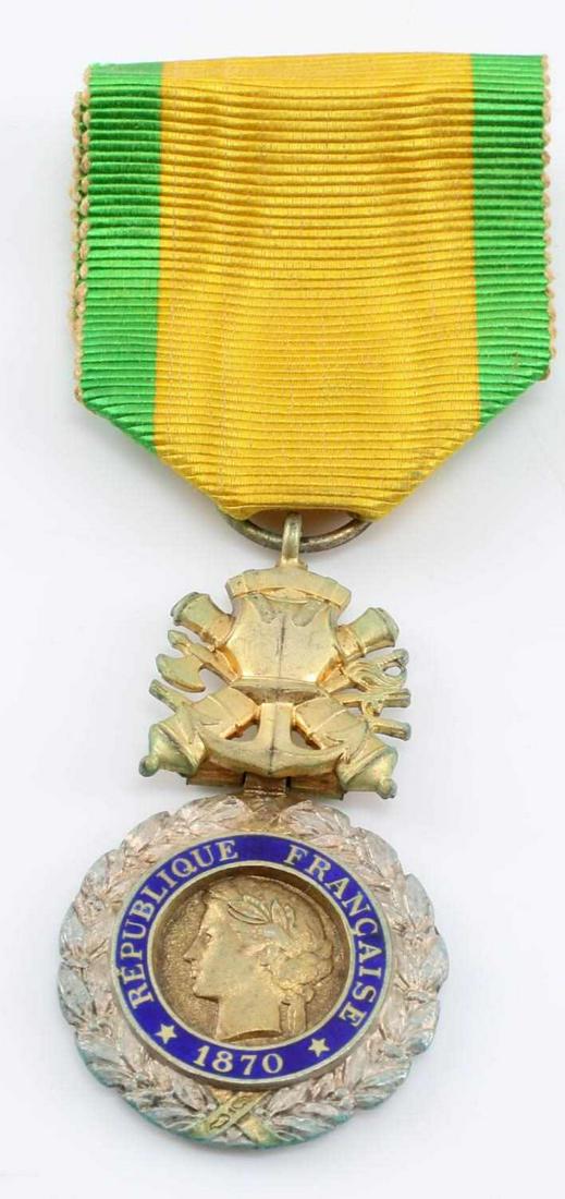 1870 FRENCH FRANCO PRUSSIAN MILITAIRE VAOR MEDAL: French 1870 Franco Prussian War Medaille Militaire Vaor Medal. Measures 1 1/16” wide by 2” tall. The front reads ‘Republique Francaise’. Has a bust image of Lady Liberty in the center. Also ha