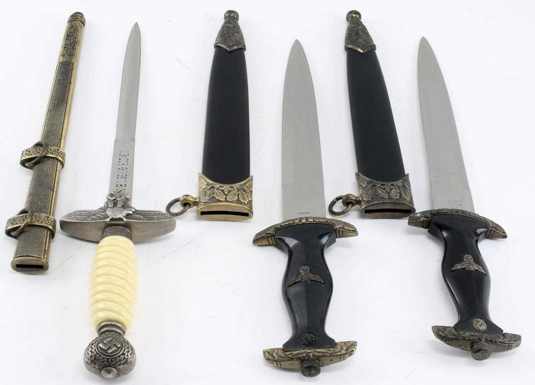 WWII THIRD REICH GERMAN SS & LUFWAFFE DAGGERS: Lot of 3 WWII German daggers: 2 SS honor daggers with blade measuring 9 inches in length, 14 inches overall, origin of manufacturer is on blade near ricasso, 1 Luftwaffe 2nd model dagger with blade me