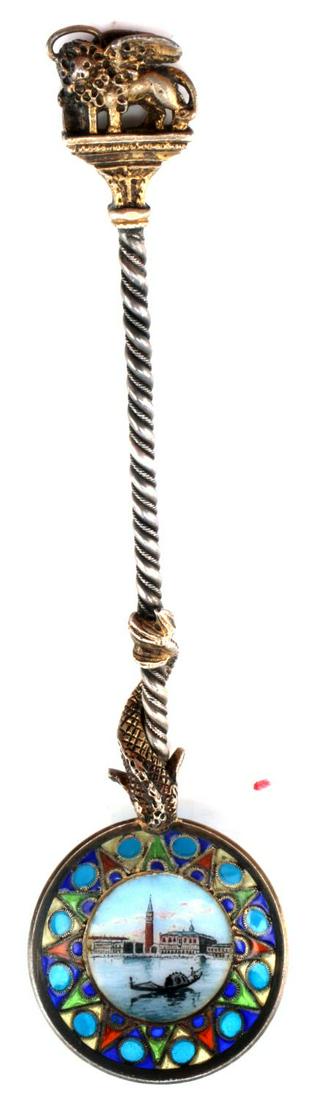 SMALL DECORATIVE VENETIAN SOUVENIR SPOON: Small Venetian decorative spoon. Features metal alloy and enamel construction. Has gondolier scene on front, with manticore and Latin phrasing on reverse, twisted handle design with fish and lion moti