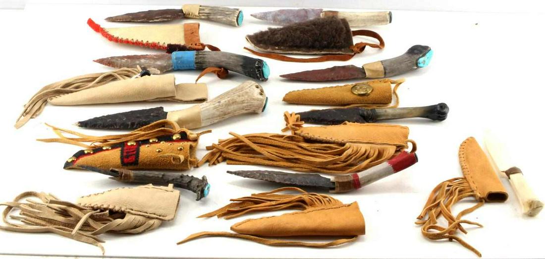 LOT OF 9 STAG HANDLED FLINT KNIVES WITH SHEATHS: Lot of 9 Native American themed stag handled flint knives with decorative leather sheaths. Feature bone and antler handle construction with knapped agate and flint blades fixed with sinew. 7 feature s