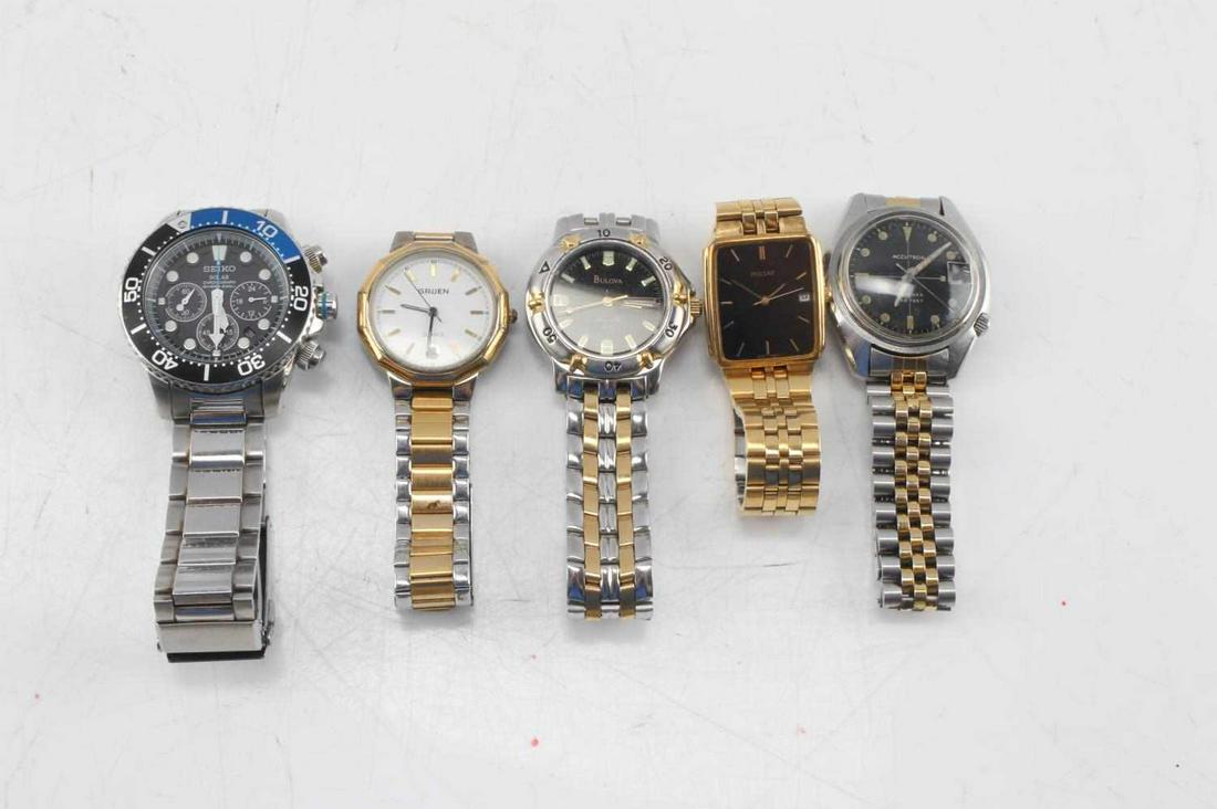 LOT OF 5 MENS WRISTWATCHES BULOVA GRUEN SEIKO MORE: Bulova Marine Star measures 3 inches across interior, Accutron Deep Sea measures 2 3/8 X 3 inches inside, some scratches, Gruen Quartz is stainless and gold tone, measures 3 inches across at widest, g