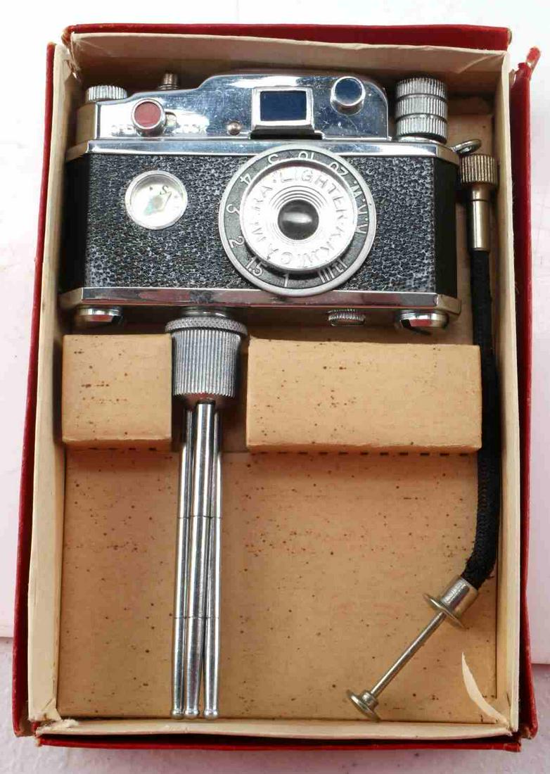 VINTAGE KKW PHOTO FLASH TABLE LIGHTER CAMERA W BOX: Table lighter camera made by KKW. Compass at front. Comes in original box. All parts present. Manual is absent.