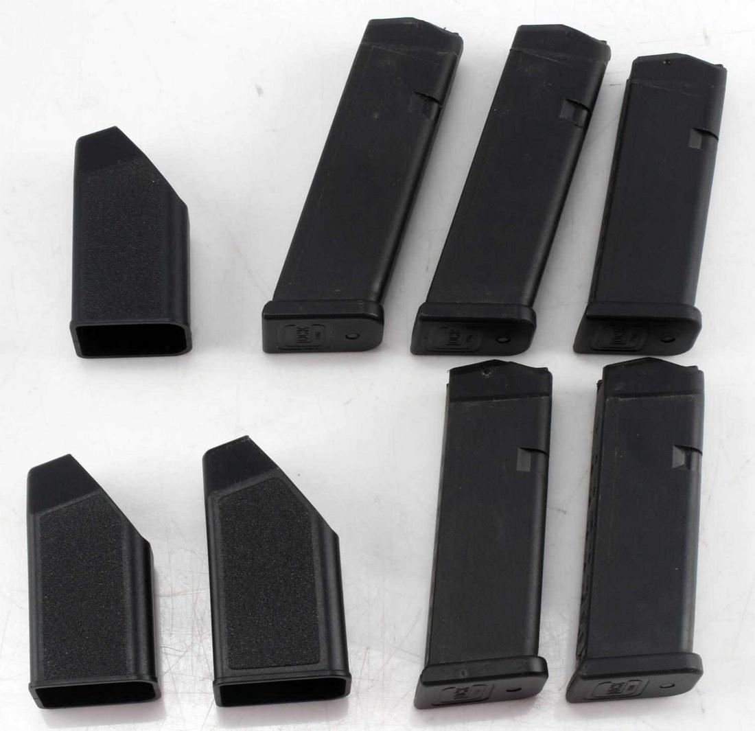 OEM GLOCK 22 23 .40 CAL HIGH CAPACITY MAG LOT OF 5: Glock 22 23 .40 Caliber High Capacity Magazine Lot of 5. Lot includes 2 15 round magazines, 2 10 round magazines and one 13 round magazine. The lot also includes three speed loaders. Very good conditi