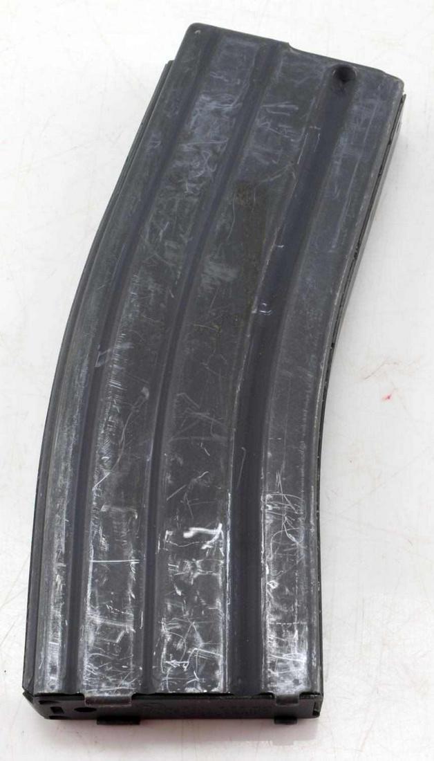 COLT 5.56MM 30 ROUND MAGAZINE GREEN FOLLOWER: Colt 30 round magazine for 5.56mm. Has green follower. 7 inches by 2.50 inches. Good condition