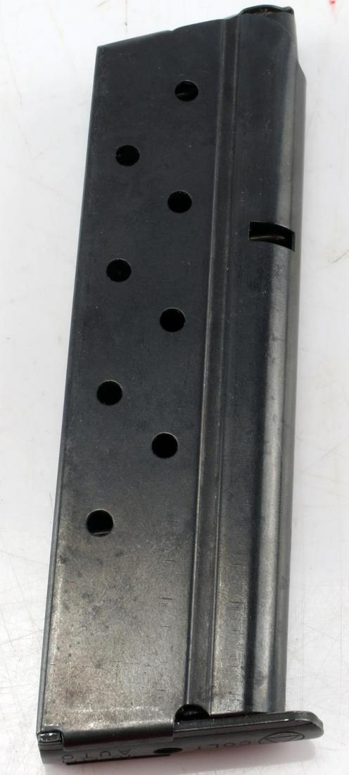 COLT 1OMM AUTO 8 ROUND MAGAZINE: Colt 10mm8 round auto magazine. Measures 4.75 inches by 1.50 inches. Good condition.