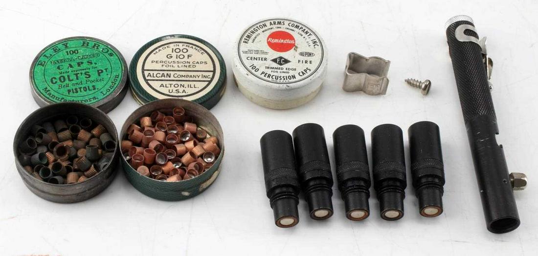 ANTIQUE TEAR GAS PEN WITH CARTRIDGES EARLY 20TH C.: Tear gas pen with 5 cartridges, in plastic case, .22 caliber, pen alone measures 4 1/8 inches long. Plus 3 cans of percussion caps.