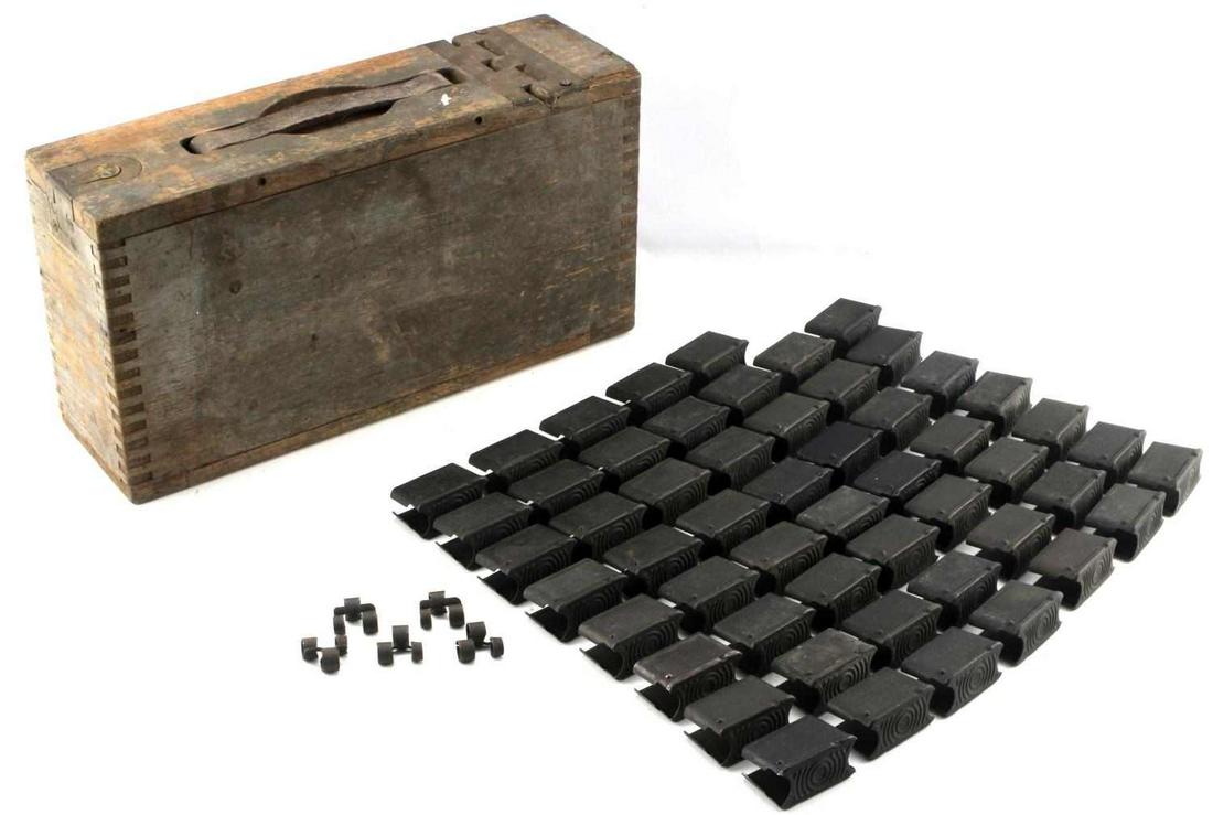 WWI US MILITARY AMMO CASE & WWII M1 GARAND CLIPS: Lot of 55 WWII M1 Garand clips inside WWI ammo case. This early example of WWI ammo box is quite rare in this condition. There is some finish loss throughout the lot. The ammo container measures 15 by