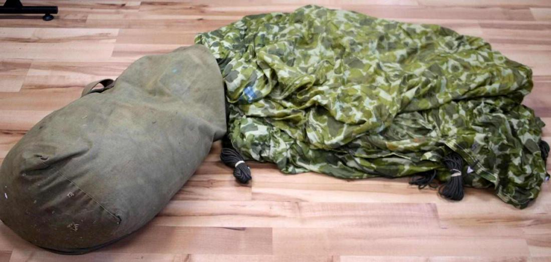 US NAVY KOREAN WAR DECOMMISSIONED PARACHUTE W BAG: US Navy Korean Decommissioned Parachute with Bag. The parachute was manufactured in January of 1951. Made and distributed by Pioneer Parachute Co. The Serial Number is "DA-50 14425". Comes with canvas
