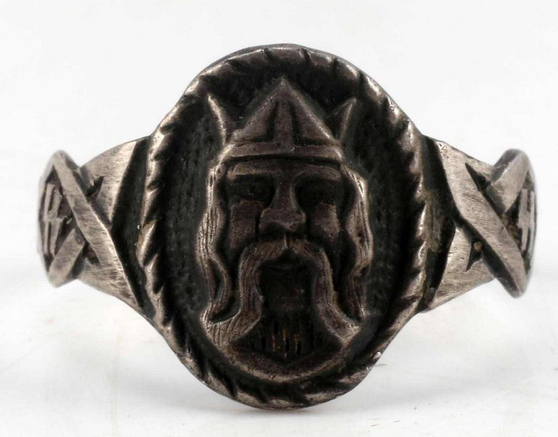 WWII GERMAN THIRD REICH SS VIKING DIV RING: WWII German Third Reich SS Viking division ring. Ring features SS runes on both sides and Viking bust relief. Marked 835 inside band. Measures 20mm inside diameter. Good condition. Unauthenticated; so