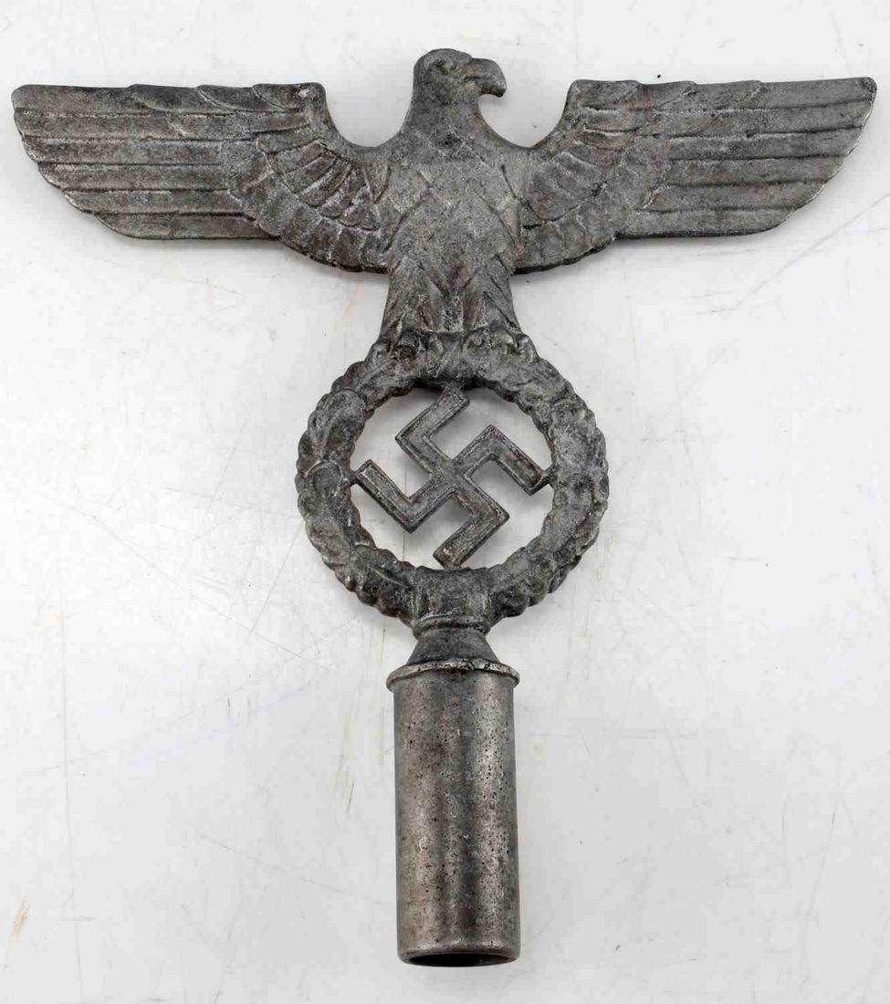 WWII THIRD REICH GERMAN NSDAP ALUMINUM TOP POLE: Flag top pole with Reichsadler depicted, one small hole at rear. Measures 10 X 9.75 inches. Very good condition.