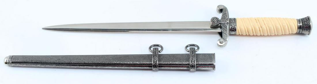 WWII GERMAN THIRD REICH HEER OFFICER DAGGER: WWII German Third Reich Heer Officer Dagger. The nickel blade is maker marked ‘F W Holler Berlin’ and measures 9.5 inches. It has their thermometer logo in the center. It measures 11/16” wide by