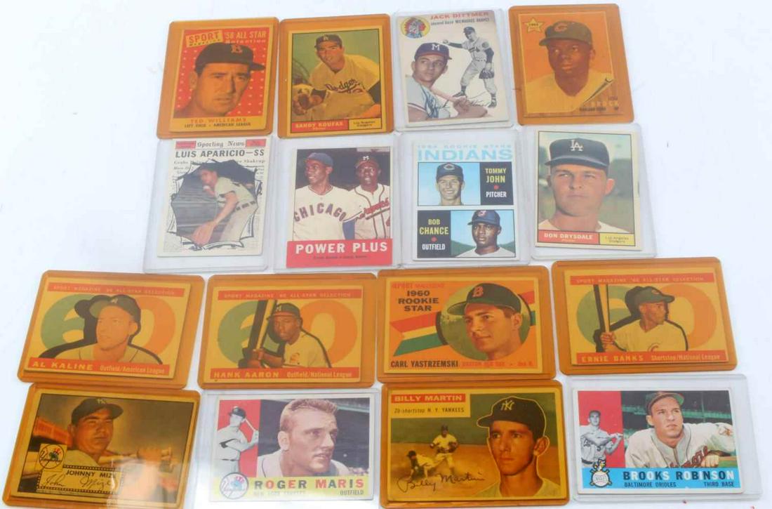 1960 TOPPS KOUFAX WILLIAMS BROCK MARIS LOT OF 16: Each card has been placed in a plastic sleeve to maintain condition. The lot includes 1954 Topps Jack Dittmer 53, 1961 Topps Sandy Koufax 344, 1960 Topps Roger Maris 377, 1960 Topps Brooks Robinson 28