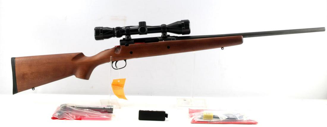 SAVAGE AXIS BOLT ACTION RIFLE .308 WIN NEW IN BOX: Matte black steel, fine wood stock, hard rubber butt, Weaver 3-9 X 40 waterproof scope attached, maker and caliber marked to left side of 22.5 inch barrel, mint bore, serial number to left side receiv