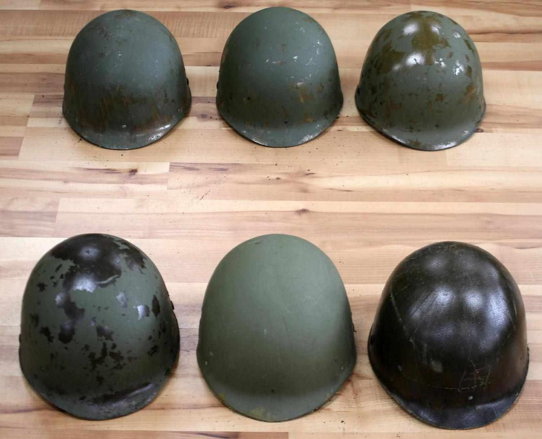 AIRBORNE VIETNAM PARATROOPER LOT OF 6 HELMET LINER: Six Vietnam M1 Paratrooper Helmet Liners. Stamped "31MAY67" on the inner cloth straps. One, however, is stamped "Jewish Guild for the Blind " along with the date. Liner itself measures approximately 1