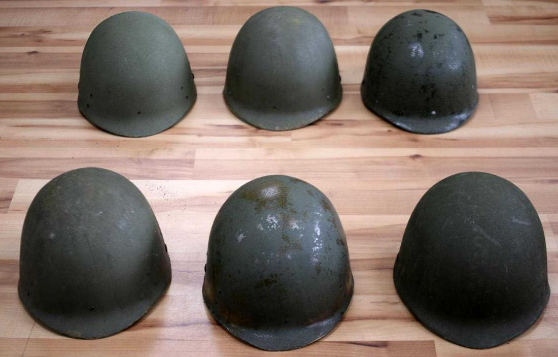 AIRBORNE VIETNAM PARATROOPER LOT OF 6 HELMET LINER: Six Vietnam M1 Paratrooper Helmet Liners. Stamped '31MAY67' on the inner cloth straps. Entirety measures approximately 10.5 inches from front to back. Oxidation, corrosion, and heavy surface wear are 