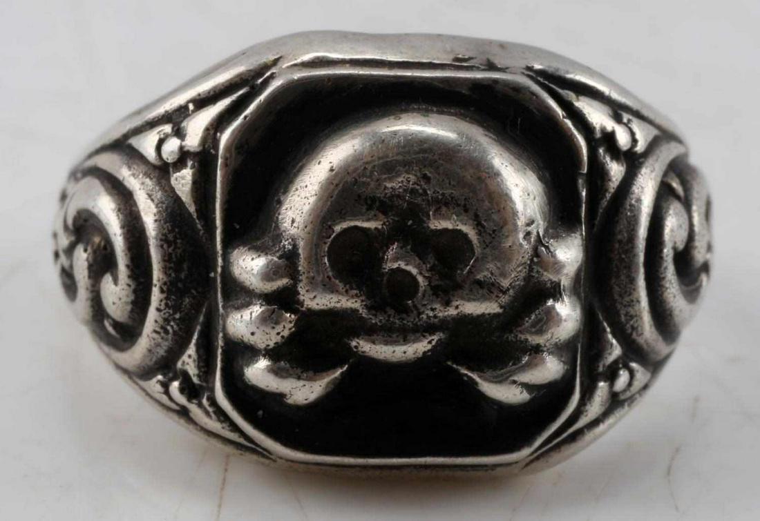 WWII GERMAN THIRD REICH SS TOTENKOPF SILVER RING: WWII German Third Reich silver ring, with totenkopf and SS runes. Has engraving on inside, and makers marks of "800" and "SS." Size 11. Good condition.
