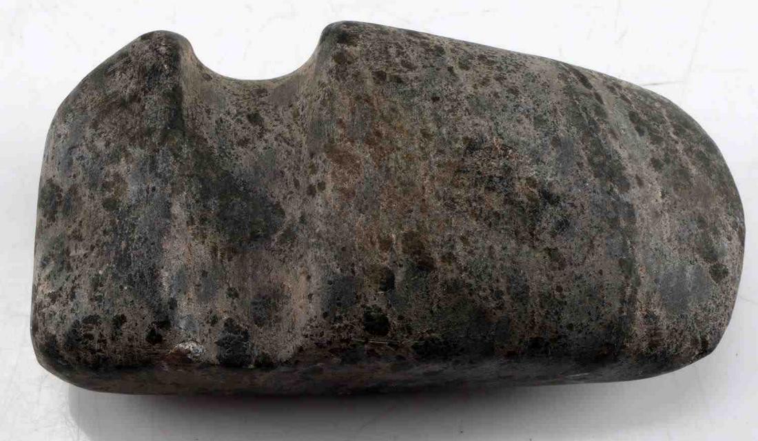 NATIVE AMERICAN GROOVED LITHIC AXE HEAD: Native American style grooved stone axe head. Measures 2.75 inches tall, 5 inches long, and 1.50 inches thick. Good condition