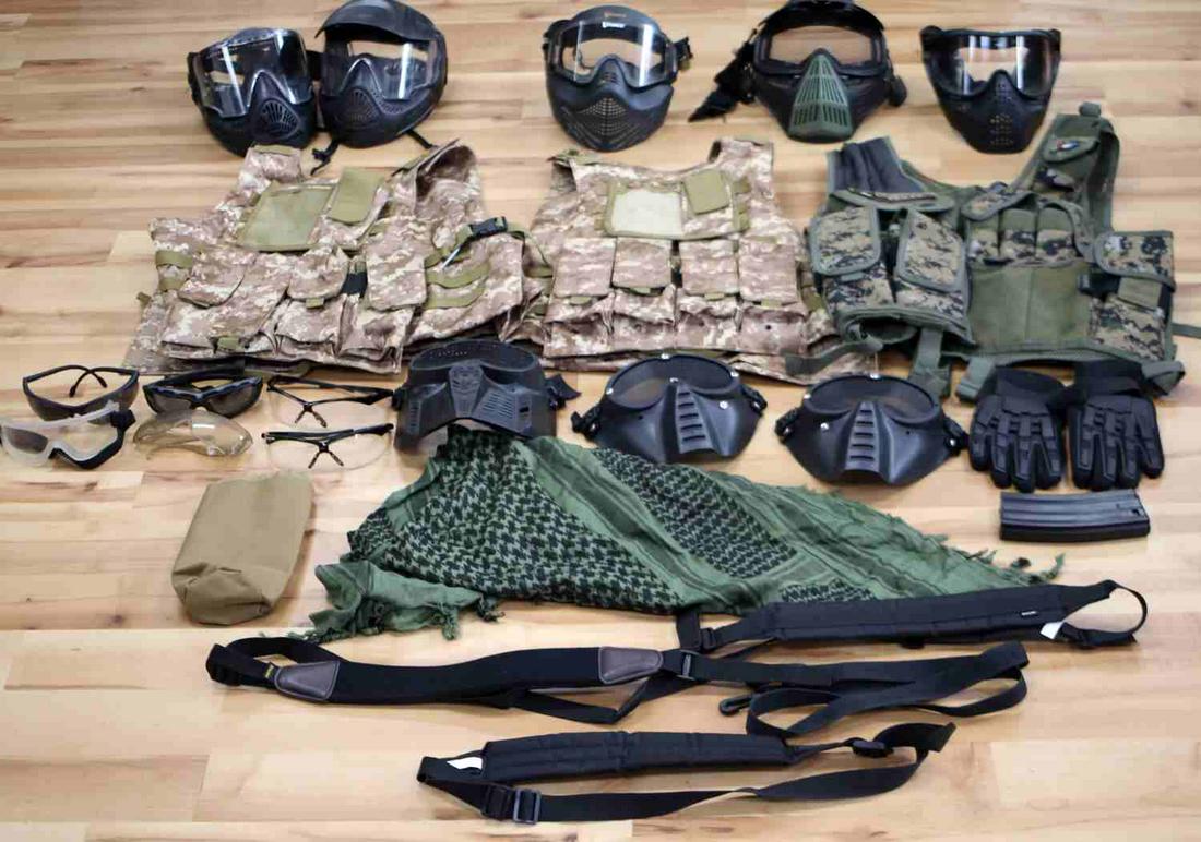 LARGE LOT OF ASSORTED AIRSOFT TACTICAL EQUIPMENT: Lot includes eight full black protective face masks, six pairs of protective eyewear: "Valken Tactical Sunglasses," two pairs of "Winchester Ballistic Safety Glasses," "ANSI Military Grade Sunglasses,