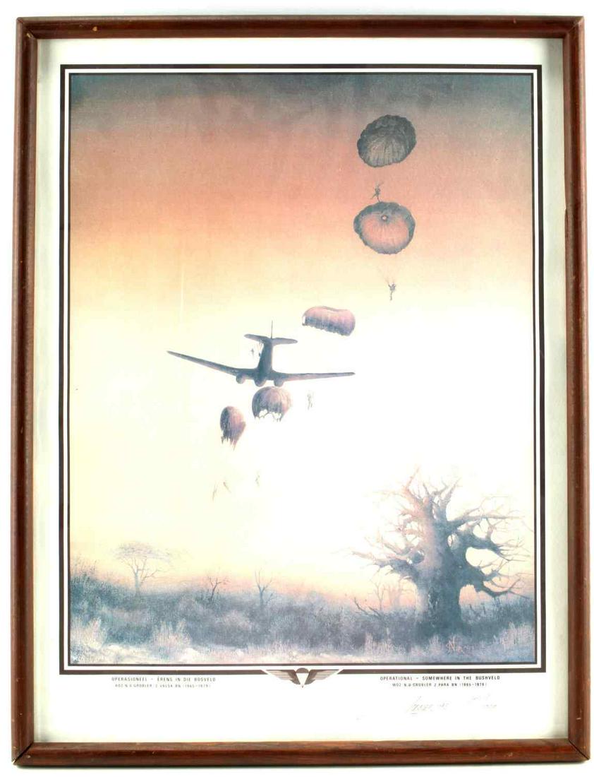 IN THE BUSHVELD FRAMED PARATROOPER PAINTING: Framed paratrooper painting titled "OPERATIONAL - SOMEWHERE IN THE BUSHVELD". Measures 18.5 by 24 inches. Depicts paratroopers jumping from plane into bush. Titled in German and English. Signed, dated