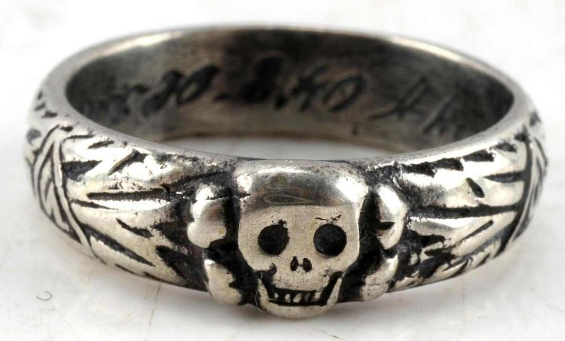 WWII GERMAN 3RD REICH HIMMLER WAFFEN SS HONOR RING: German WWII Waffen SS Honor ring. Has signature of Himmler, date of the awarding and name of the recipient engraved inside of the ring. Has silver/maker's markings. Size 11 Unauthenticated, sold as is