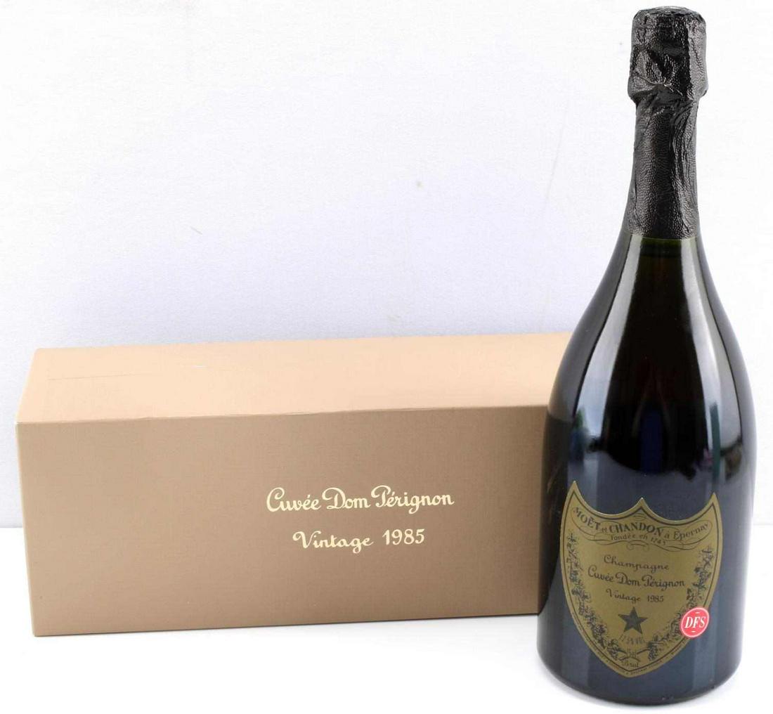 UNOPENED 1985 DOM PERIGON CHAMPAGNE: Excellent fill level boxed with papers.